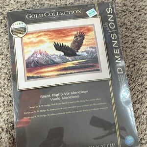 Retired The gold collection silent flight cross stitch